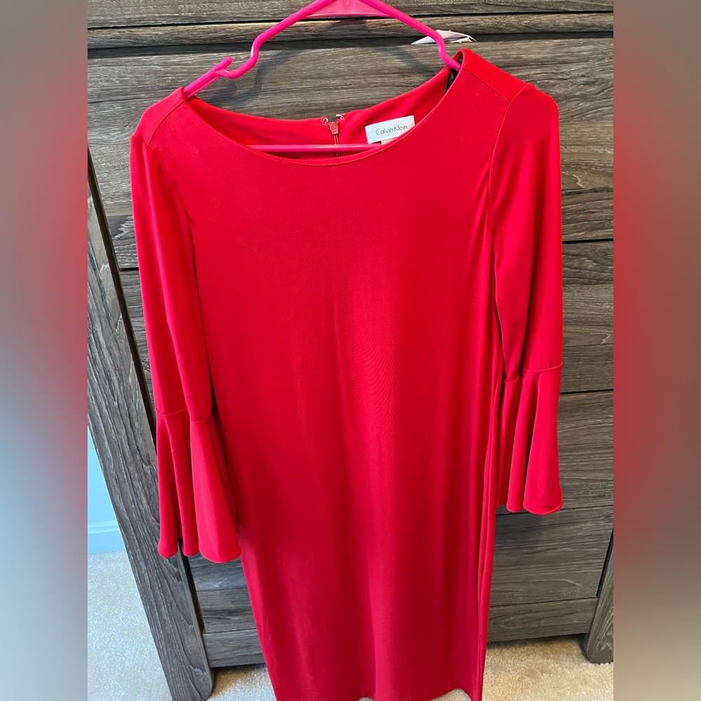Calvin klein red dress size 8 with ruffle sleeve worn once